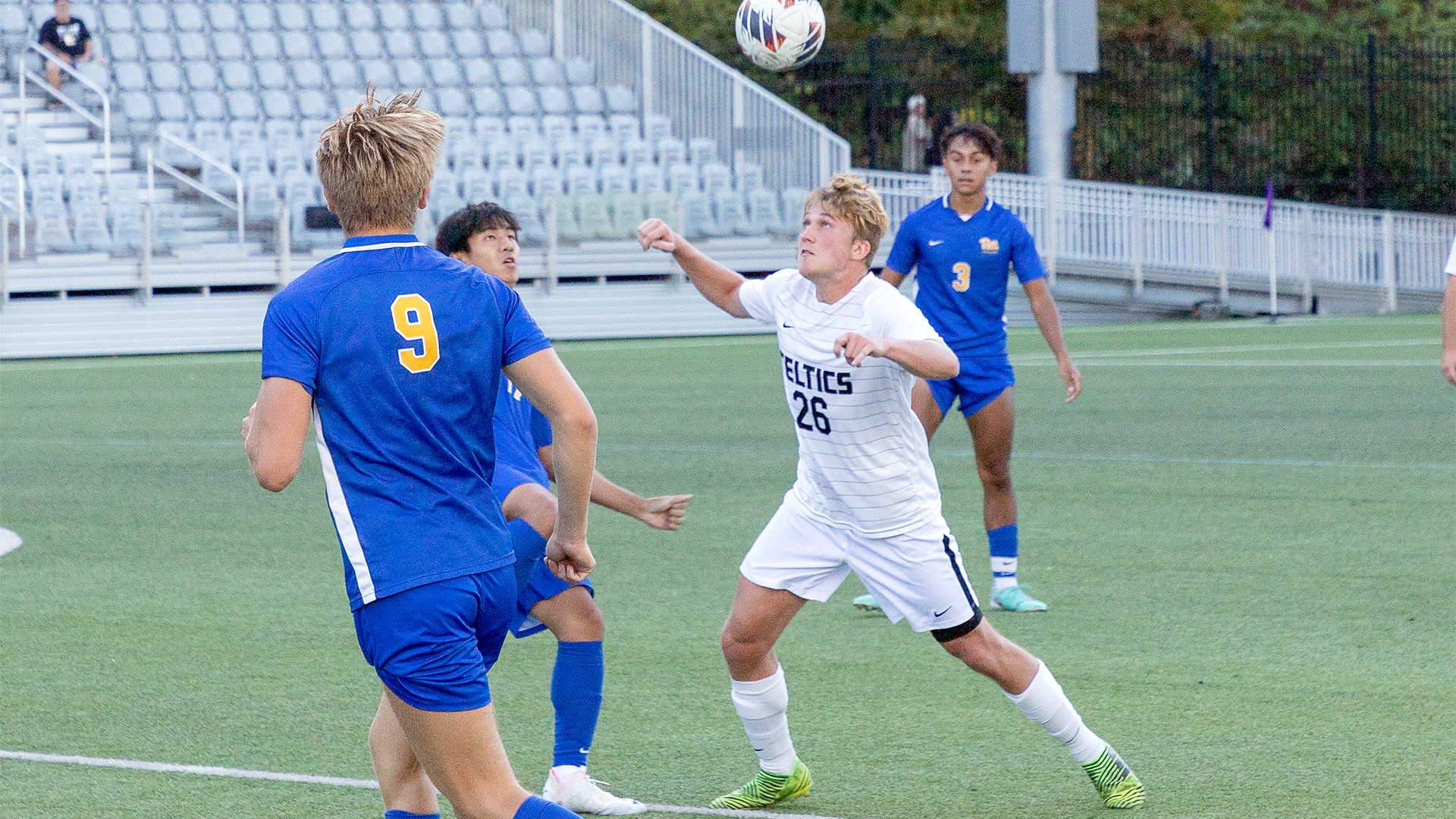 Rudy Nickles heads the ball away from the opposing team. Photo by Robert Cifone.