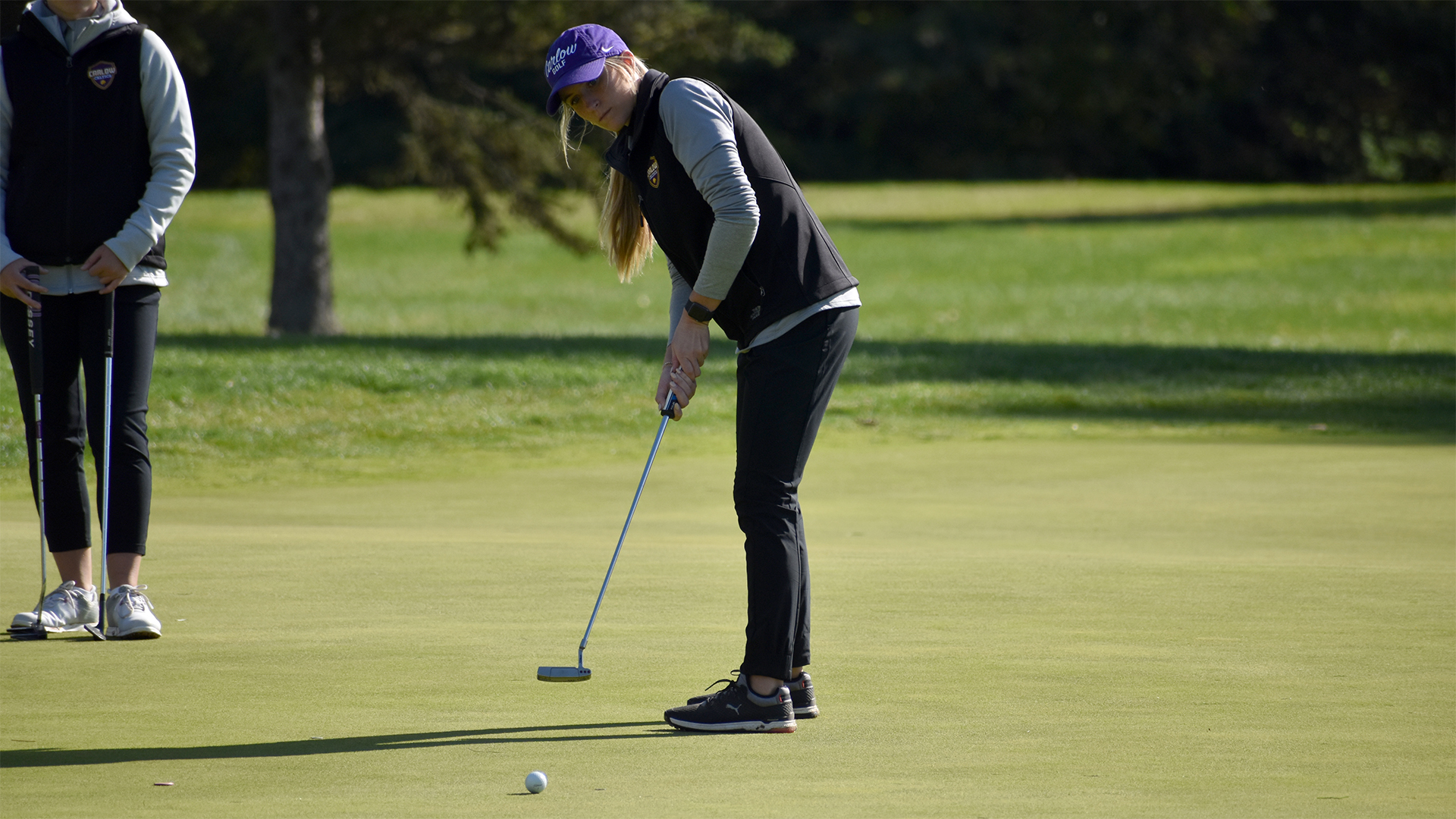 Emilee Miller sinks the put. Archived photo courtesy of the USCAA.